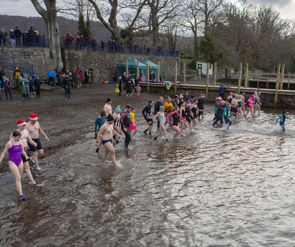 Swimmers entering the water for our New Year's Day Dip