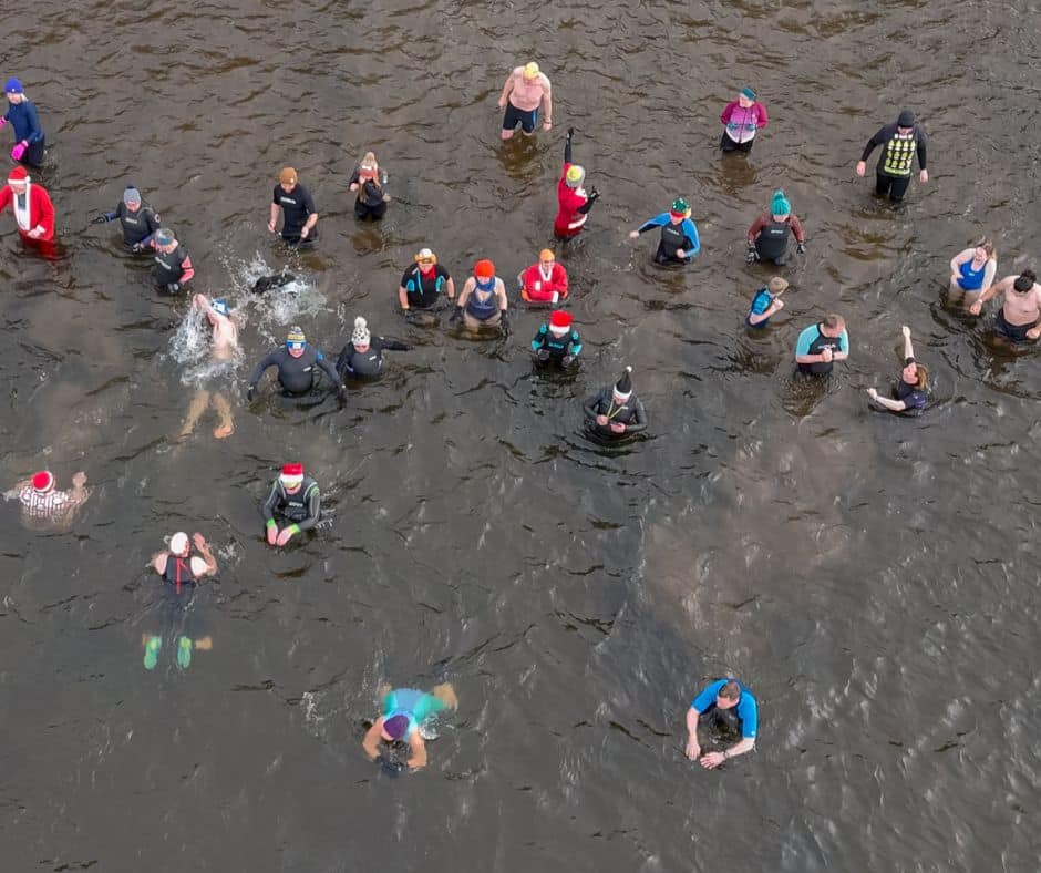 Aerial photo of swimmers in the water for our New Year's Day Dip