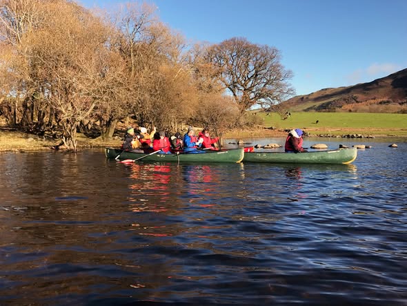 Learners from Hopwood Hall College canoeing on Bassenthwaite Lake