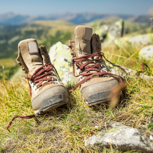 walking boots on the side of a hill