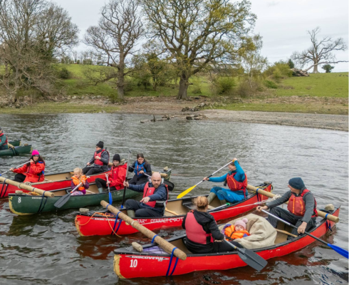 Group of canoes on the water