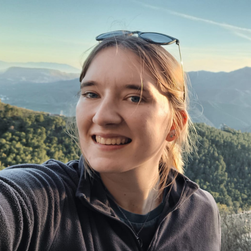 Selfie of a young woman in the mountains